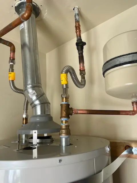 Water heater installation and plumbing repair in Cheltenham Village